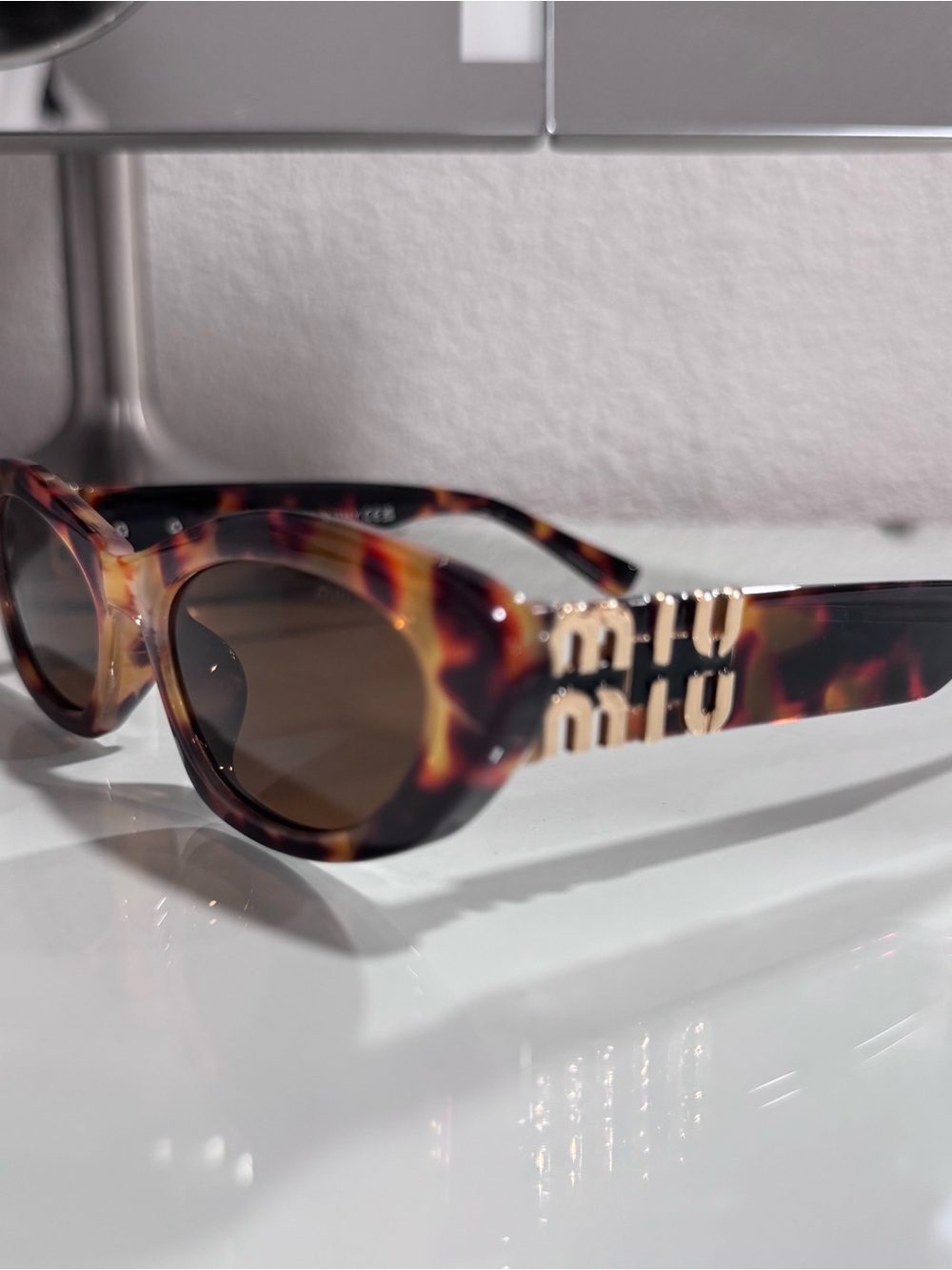 Miu Miu Tortoiseshell Logo Sunglasses - Brown Lenses
